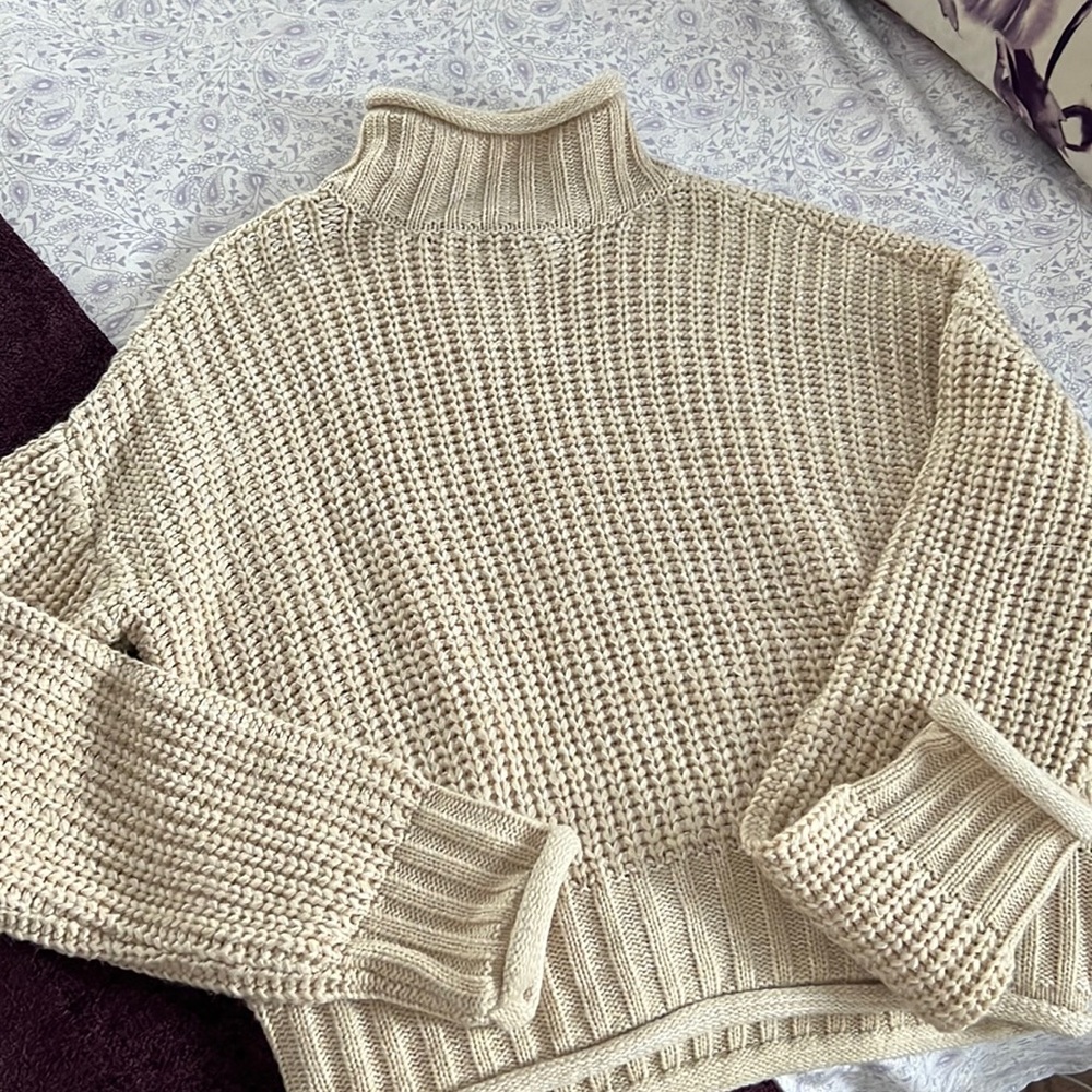 Tan turtleneck sweater
